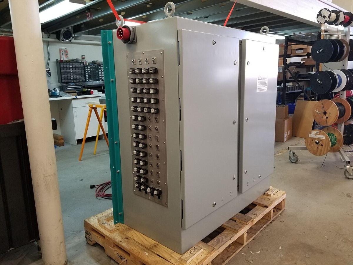 Control cabinet on a pallet in a panel assembly workshop